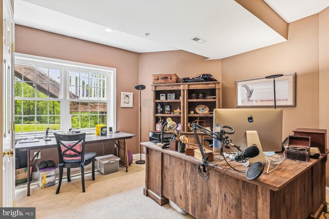 carpeted office with recessed lighting