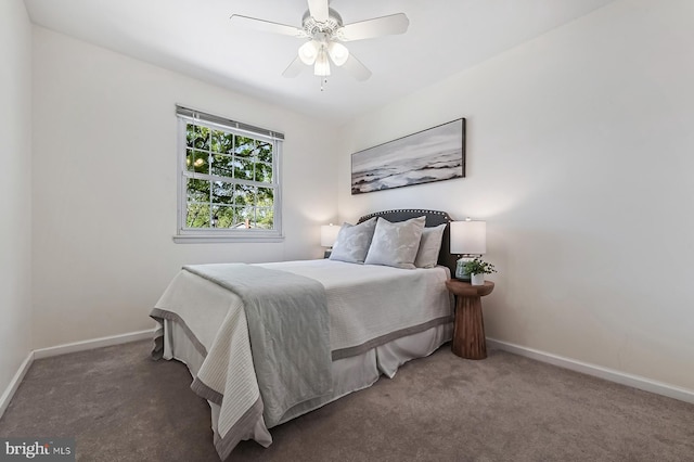 bedroom featuring carpet floors, baseboards, and ceiling fan