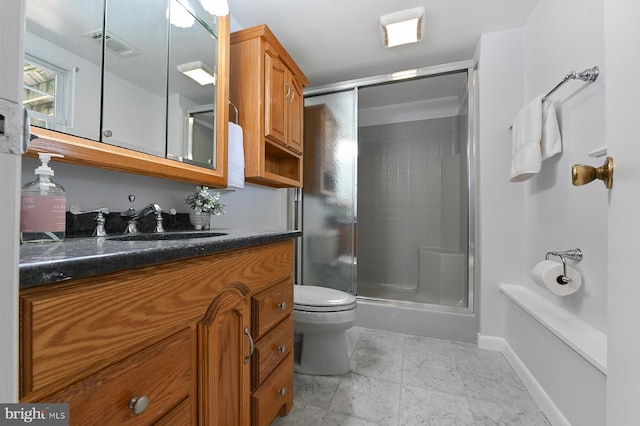 full bath with visible vents, vanity, toilet, baseboards, and an enclosed shower