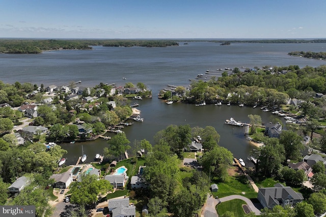 aerial view with a residential view and a water view