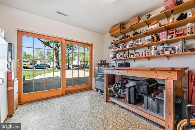 interior space featuring visible vents and a wealth of natural light
