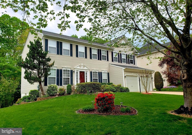 15533 Pamplin Pipe Ct, Manassas, VA 20112 - colonial-style house with a garage, a front yard, and concrete driveway