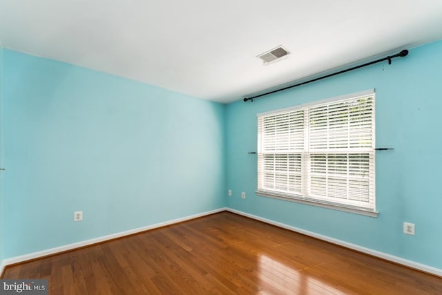 15533 Pamplin Pipe Ct, Manassas, VA 20112 - unfurnished room with wood finished floors and baseboards