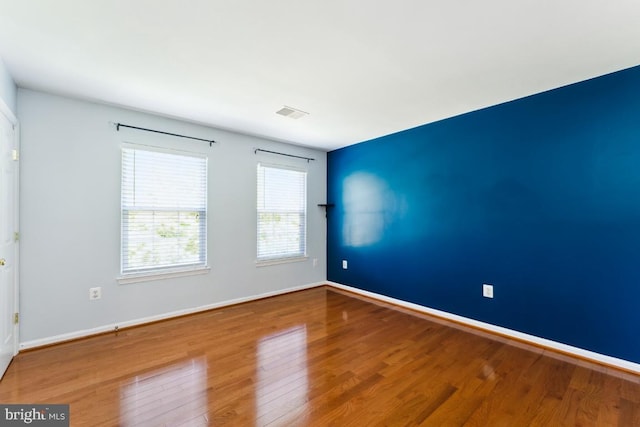 15533 Pamplin Pipe Ct, Manassas, VA 20112 - spare room featuring wood finished floors and baseboards