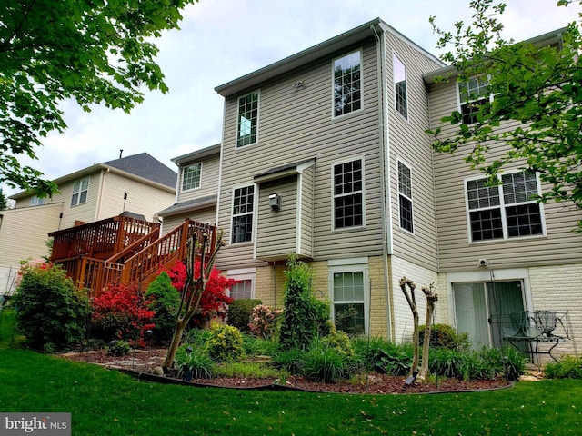 15533 Pamplin Pipe Ct, Manassas, VA 20112 - rear view of property featuring a lawn and brick siding