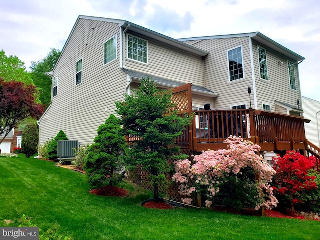 15533 Pamplin Pipe Ct, Manassas, VA 20112 - view of side of property with a deck, a yard, and cooling unit