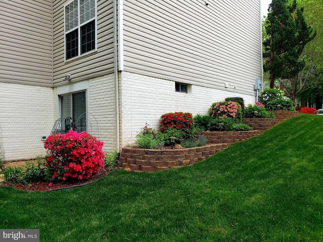 15533 Pamplin Pipe Ct, Manassas, VA 20112 - view of side of home featuring a yard and brick siding