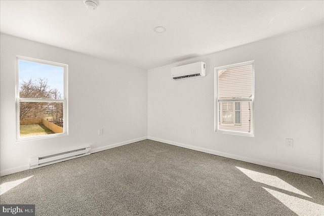 unfurnished room featuring baseboards, a wall mounted air conditioner, carpet, and a baseboard radiator