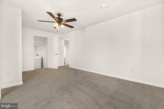 carpeted empty room with baseboards and ceiling fan