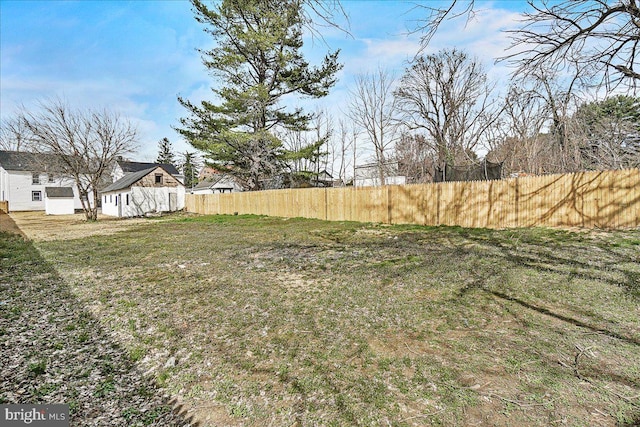 view of yard featuring fence