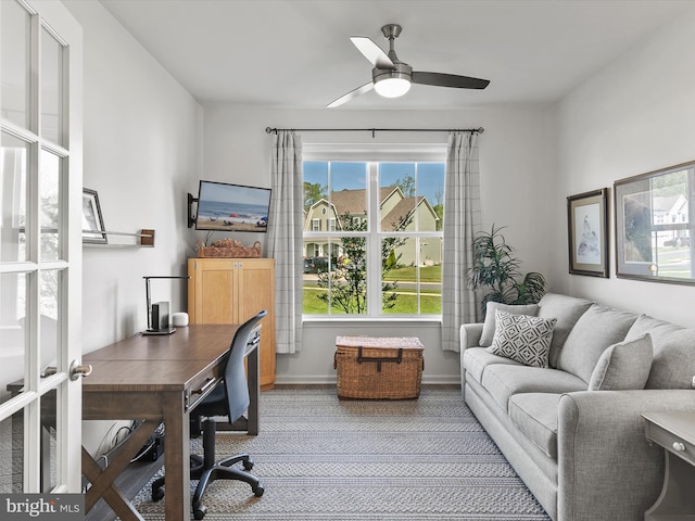 20515 Anchor Ln, Frankford, DE 19945 - carpeted home office with baseboards and a ceiling fan