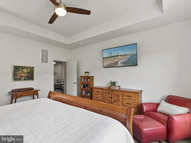 20515 Anchor Ln, Frankford, DE 19945 - bedroom with ceiling fan, visible vents, and a raised ceiling