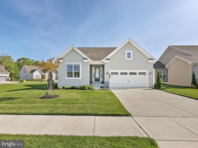 20515 Anchor Ln, Frankford, DE 19945 - view of front facade featuring driveway, a front yard, and a garage