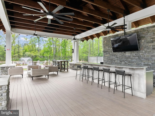20515 Anchor Ln, Frankford, DE 19945 - wooden deck with an outdoor bar, a ceiling fan, and fence