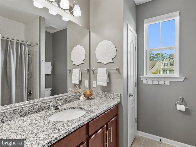 20515 Anchor Ln, Frankford, DE 19945 - full bathroom with a tile shower, baseboards, tile patterned floors, vanity, and toilet