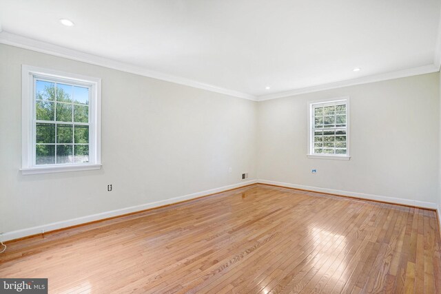 9239 Sand Creek Ct, Burke, VA 22015 - spare room with crown molding, recessed lighting, baseboards, and light wood-style floors