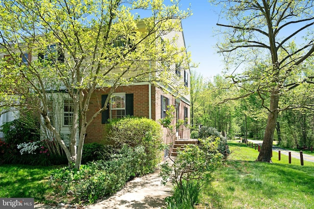 9239 Sand Creek Ct, Burke, VA 22015 - view of side of property featuring a lawn and brick siding