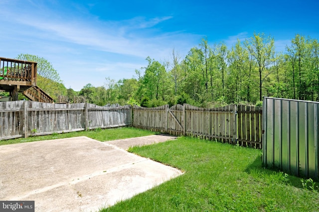 view of yard featuring a fenced backyard and a patio area