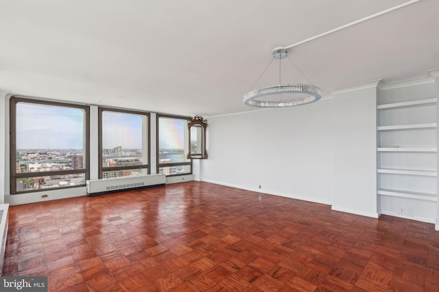 200 Locust St Unit 24Bn, Philadelphia, PA 19106 - interior space with an inviting chandelier, baseboards, and built in shelves