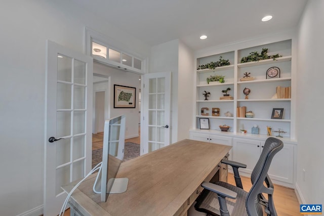 office space with french doors, recessed lighting, and light wood-style flooring