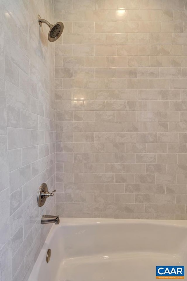 full bath featuring shower / bath combination