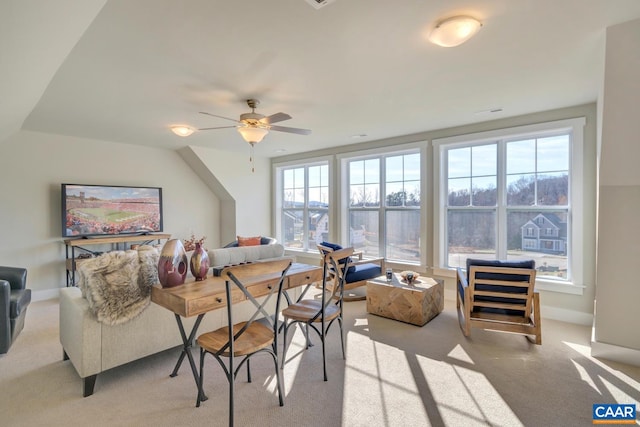 interior space featuring carpet floors and ceiling fan