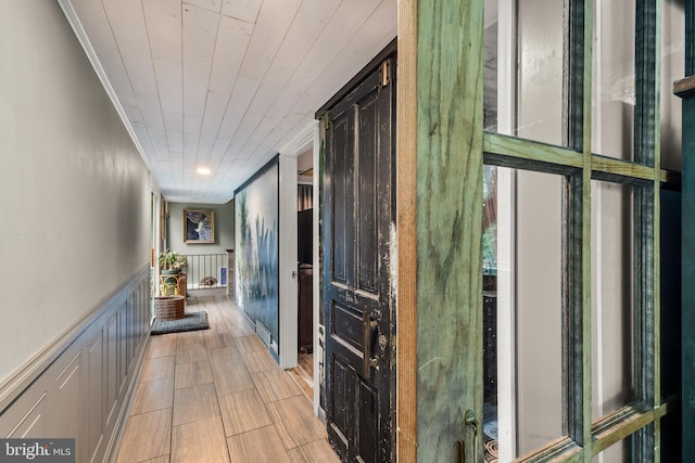117 Holly Ln, Pilesgrove, NJ 08098 - corridor with crown molding, a decorative wall, and a wainscoted wall