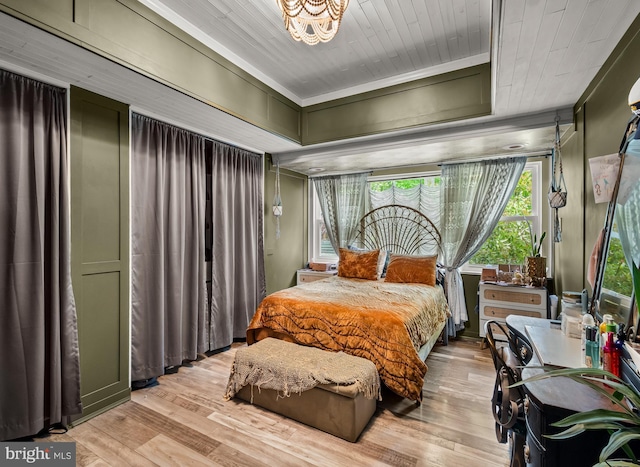 117 Holly Ln, Pilesgrove, NJ 08098 - bedroom featuring light wood-type flooring, a chandelier, and crown molding
