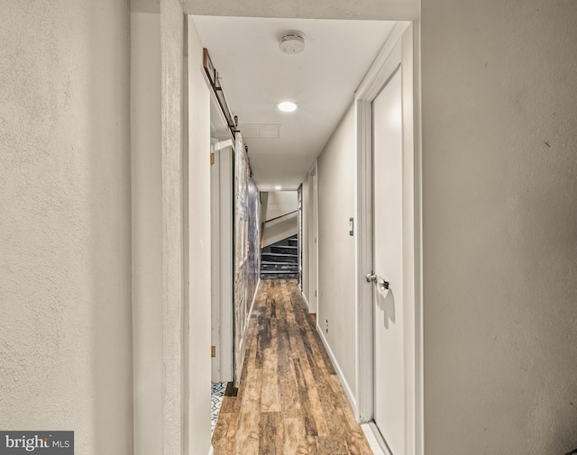 117 Holly Ln, Pilesgrove, NJ 08098 - corridor with wood finished floors and a textured wall