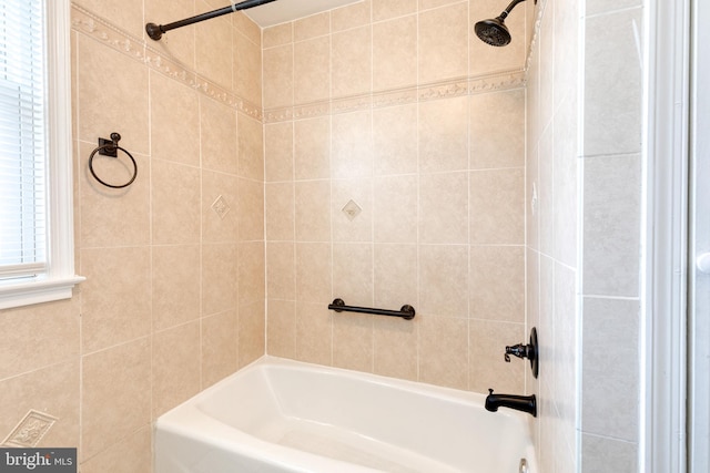 bathroom with shower / washtub combination