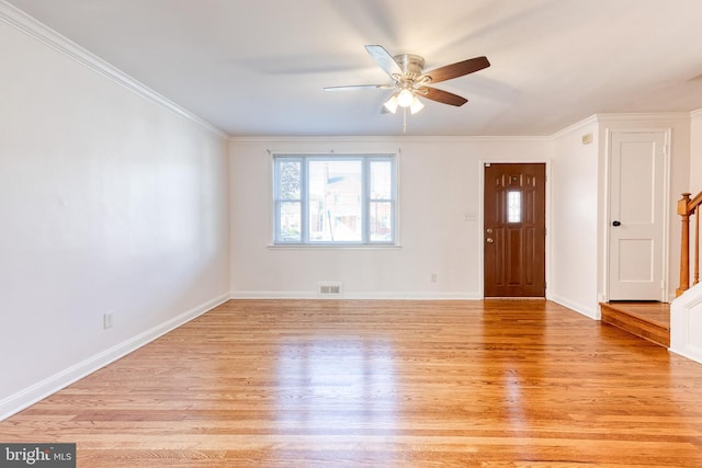 unfurnished living room with light wood-style flooring, stairs, a ceiling fan, baseboards, and visible vents