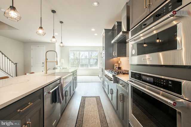 362 Star Tavern Ln, West Chester, PA 19382 - kitchen with decorative light fixtures, appliances with stainless steel finishes, wood finished floors, a sink, and recessed lighting