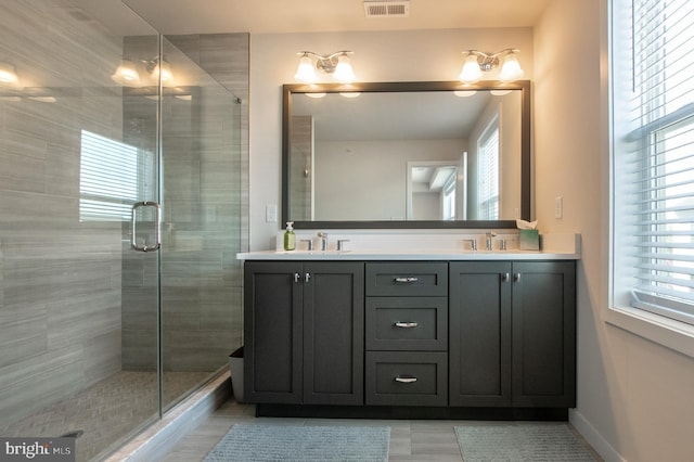 362 Star Tavern Ln, West Chester, PA 19382 - full bathroom featuring double vanity, a shower stall, a sink, and visible vents