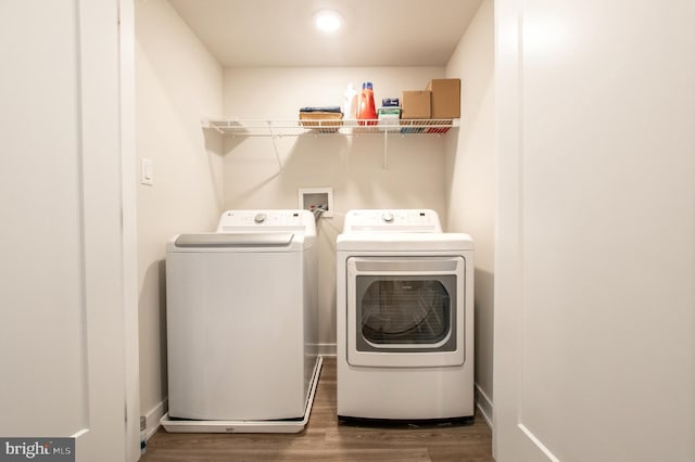 362 Star Tavern Ln, West Chester, PA 19382 - laundry room featuring laundry area, independent washer and dryer, and wood finished floors
