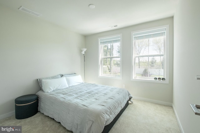 362 Star Tavern Ln, West Chester, PA 19382 - bedroom with baseboards, light carpet, and visible vents