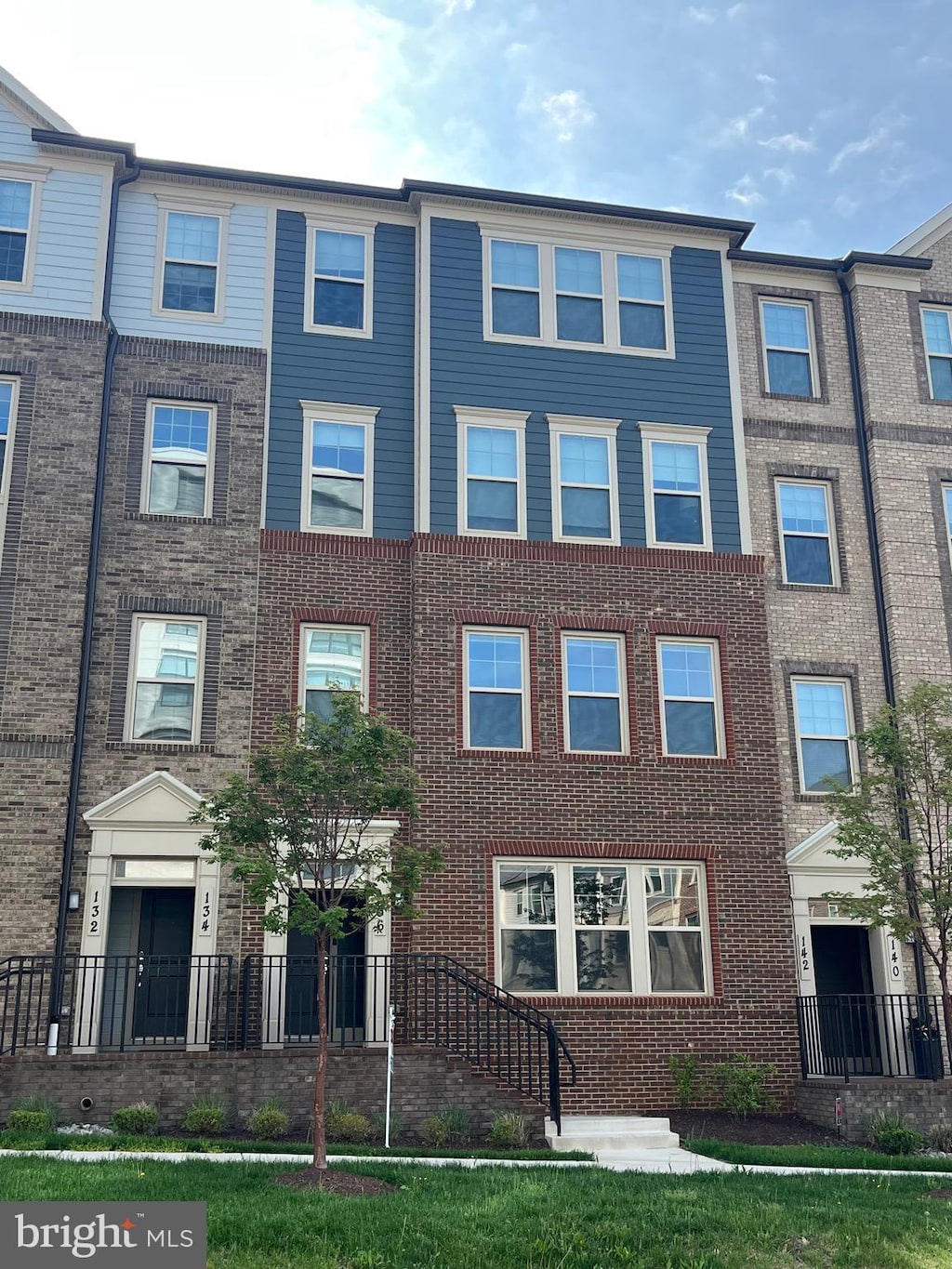 exterior space with brick siding