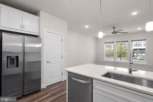 136 Salinger Dr Unit 136, Gaithersburg, MD 20878 - kitchen featuring stainless steel appliances, a sink, white cabinetry, dark wood-style flooring, and recessed lighting
