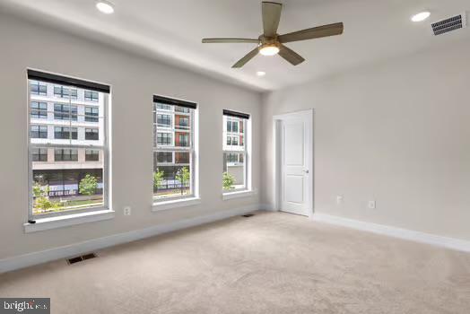 136 Salinger Dr Unit 136, Gaithersburg, MD 20878 - carpeted empty room with baseboards, ceiling fan, and recessed lighting
