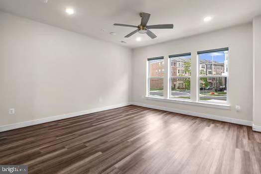 136 Salinger Dr Unit 136, Gaithersburg, MD 20878 - empty room with baseboards, wood finished floors, a ceiling fan, and recessed lighting