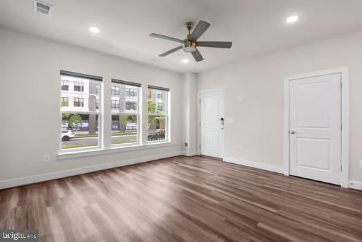 136 Salinger Dr Unit 136, Gaithersburg, MD 20878 - unfurnished room with a ceiling fan, baseboards, wood finished floors, and recessed lighting