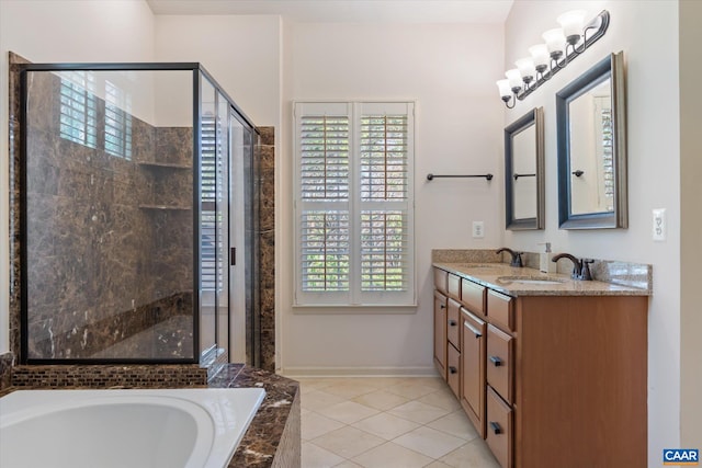 full bath featuring a garden tub, double vanity, tile patterned floors, a shower stall, and a sink