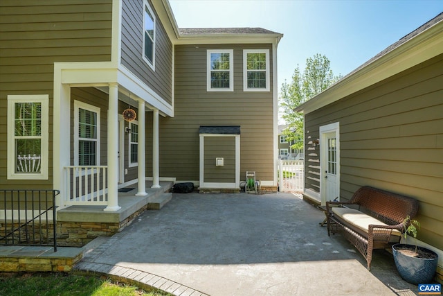 view of patio featuring concrete driveway