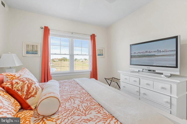 bedroom featuring visible vents