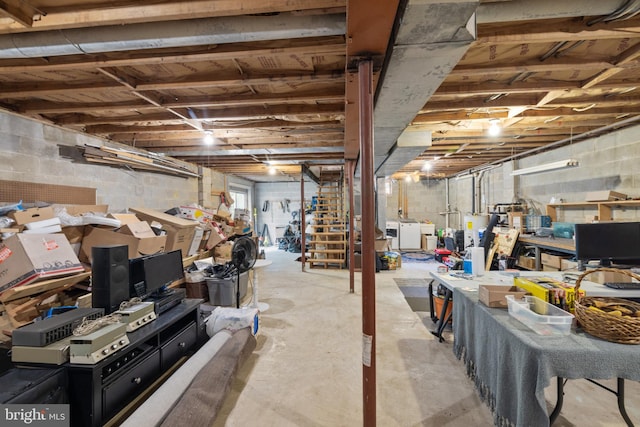 basement with washing machine and clothes dryer