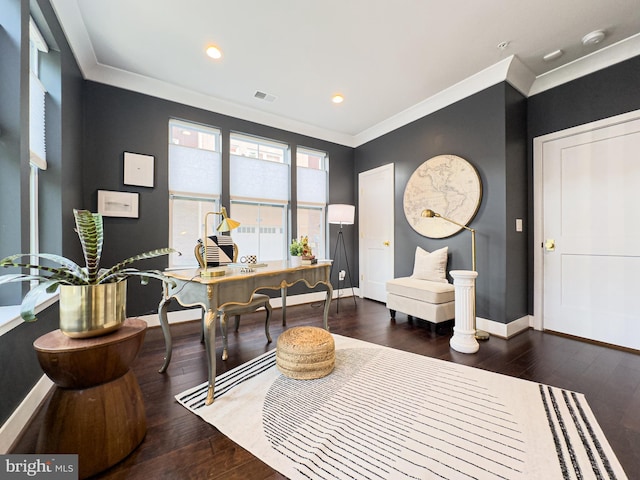 office with visible vents, ornamental molding, baseboards, and hardwood / wood-style flooring