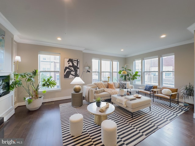 living room with baseboards, ornamental molding, recessed lighting, and dark wood-type flooring