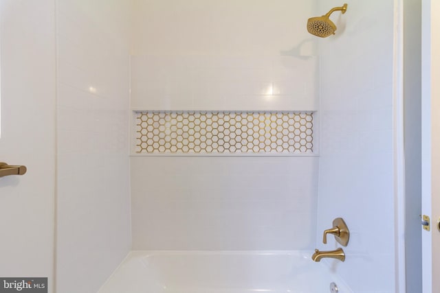 full bath featuring shower / bathing tub combination