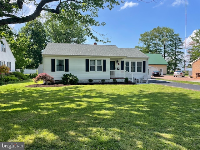 3 Talbot Ave, Cambridge, MD 21613 - view of front of home featuring a front lawn, roof with shingles, a chimney, and crawl space