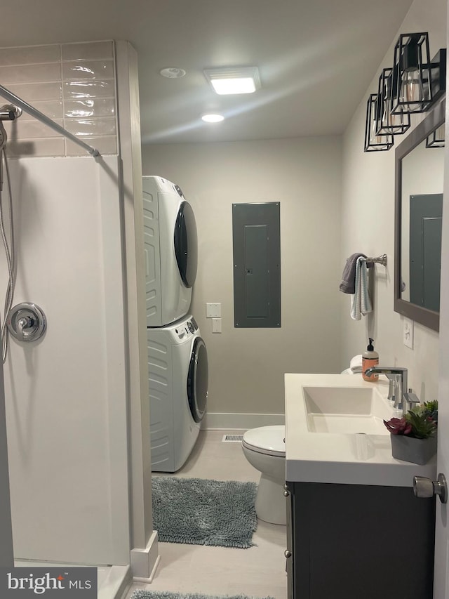 3 Talbot Ave, Cambridge, MD 21613 - full bath with electric panel, estacked washer and dryer, baseboards, vanity, and a shower