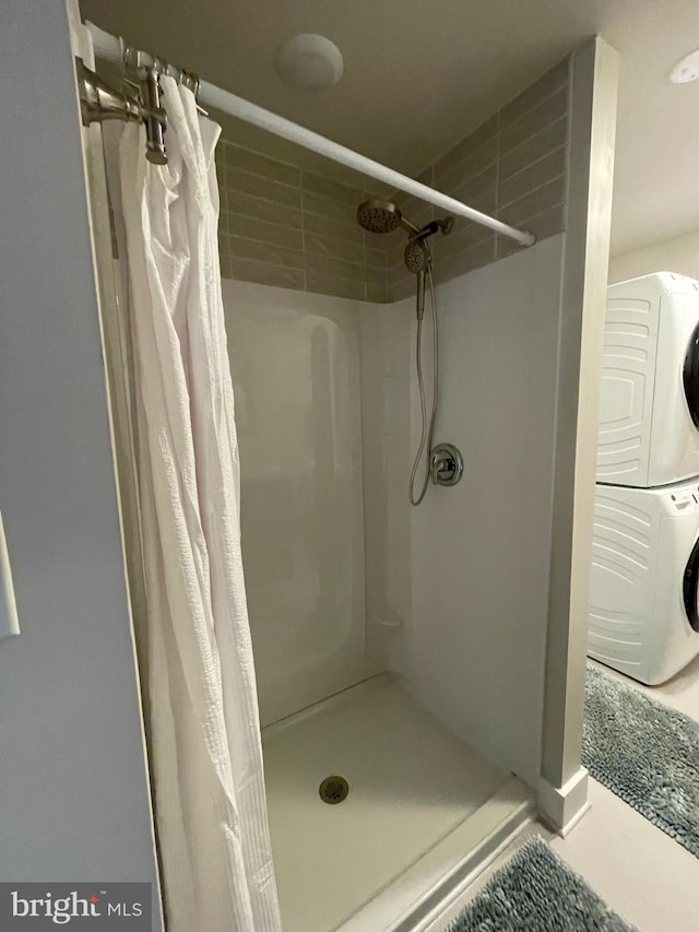 3 Talbot Ave, Cambridge, MD 21613 - full bath featuring a stall shower and stacked washing machine and dryer
